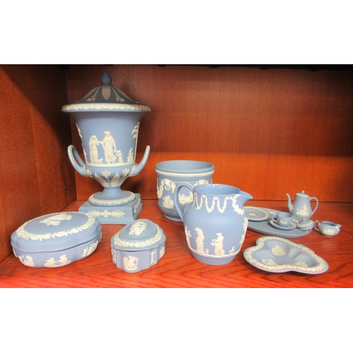 87 - Wedgwood powder blue jasperware items: to include a twin handled pedestal vase and cover  11.5