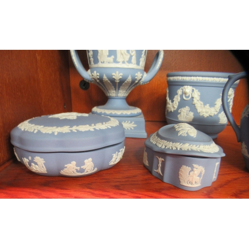 87 - Wedgwood powder blue jasperware items: to include a twin handled pedestal vase and cover  11.5