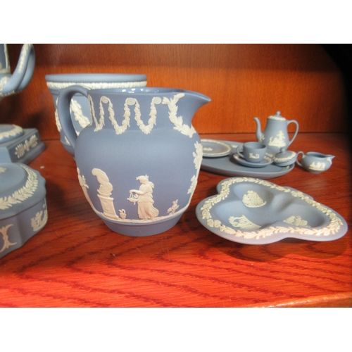 87 - Wedgwood powder blue jasperware items: to include a twin handled pedestal vase and cover  11.5