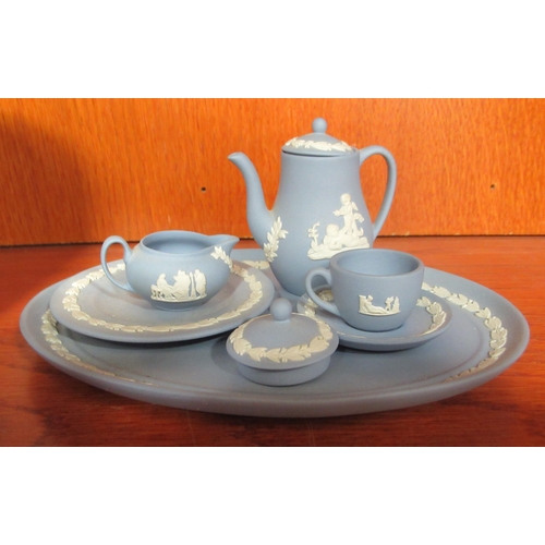 87 - Wedgwood powder blue jasperware items: to include a twin handled pedestal vase and cover  11.5