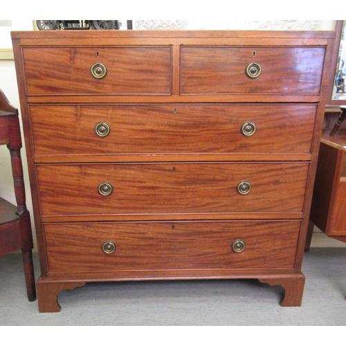 98 - A late George III string inlaid mahogany dressing chest with two short/three long drawers, raised on... 