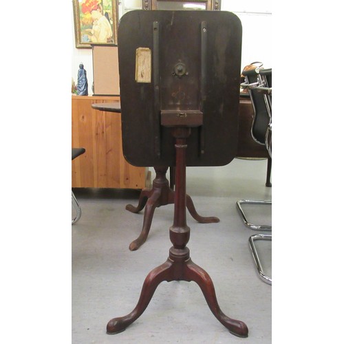 15 - A late 19thC mahogany pedestal table, on a turned column and tripod base  29