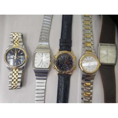 28 - Five various modern wristwatches: to include a Tissot, faced by a baton dial 