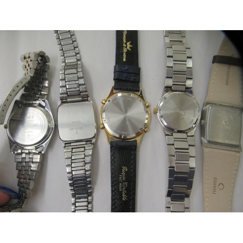 28 - Five various modern wristwatches: to include a Tissot, faced by a baton dial 