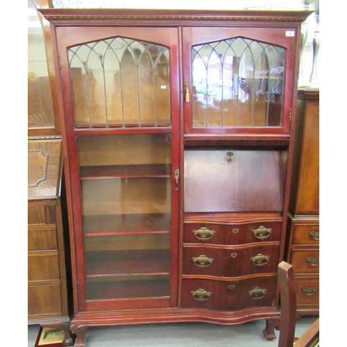 101 - An Edwardian mahogany display cabinet, comprising an arrangement of full height lead glazed doors an... 