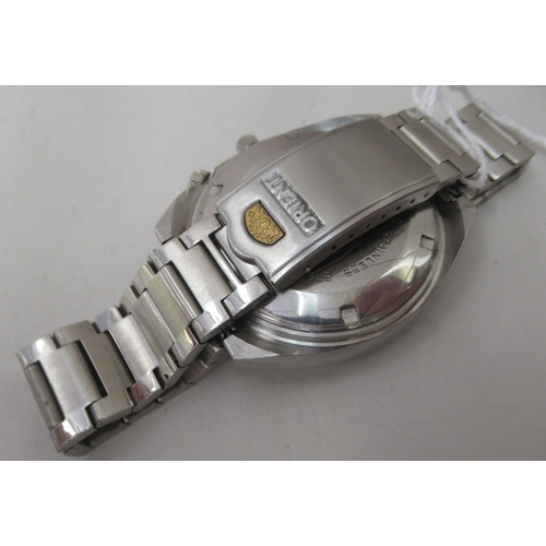 264 - An Orient stainless steel cased calendar automatic bracelet watch