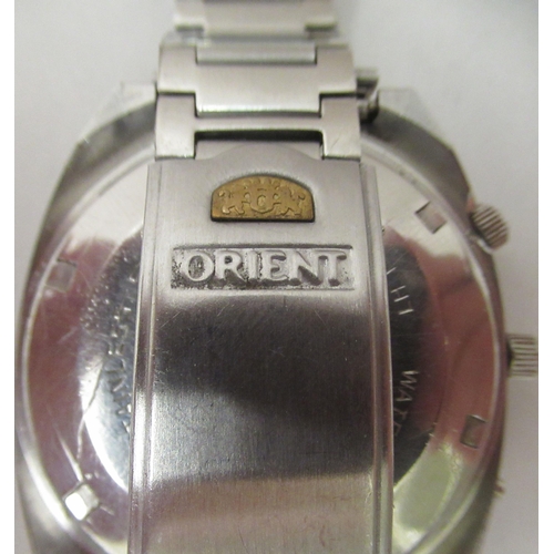 264 - An Orient stainless steel cased calendar automatic bracelet watch