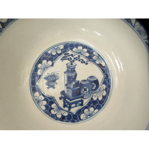 265 - A 19thC Chinese porcelain bowl, decorated with figures and flora  bears a four character mark  8.5