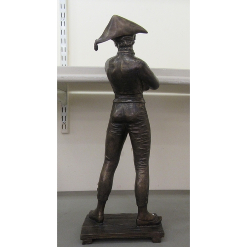 266 - A modern bronze effect figure, a young pirate with arms folded  19