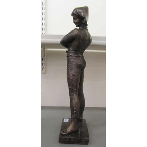 266 - A modern bronze effect figure, a young pirate with arms folded  19