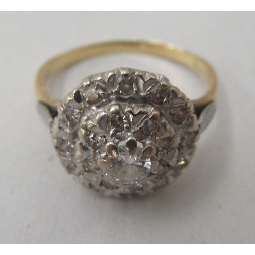 270 - An 18ct gold graduated and tiered diamond cluster ring