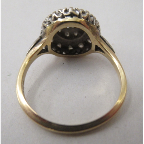 270 - An 18ct gold graduated and tiered diamond cluster ring