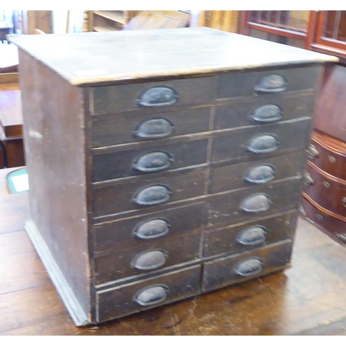 274 - An early 20thC stained pine fourteen drawer, table top collector's cabinet, on a plinth  17