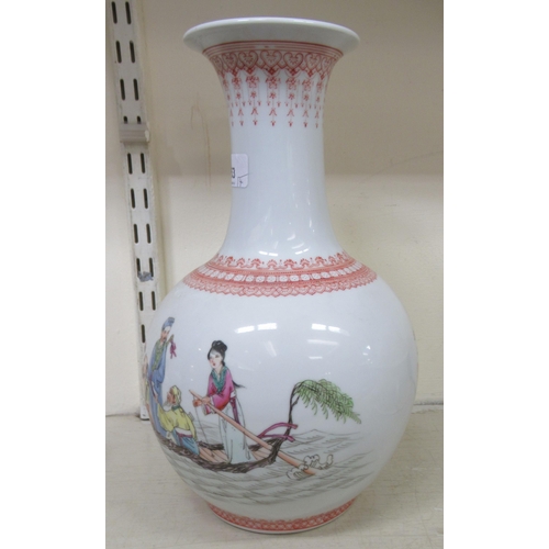 53 - Oriental ceramics: to include a mid 20thC Chinese porcelain vase, decorated with figures, in a boat&... 