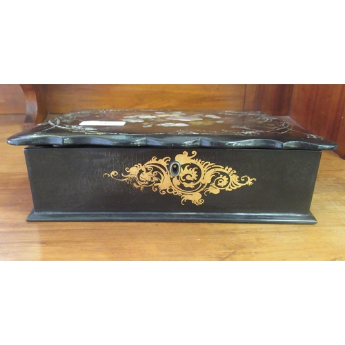 97 - A late Victorian mother-of-pearl inlaid and gilded papier mache writing box with a hinged lid, enclo... 