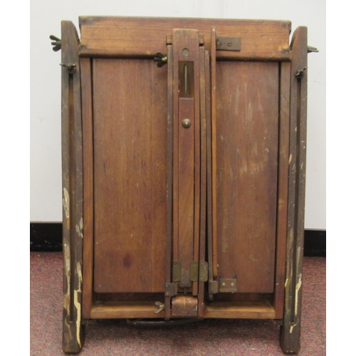 108 - An early 20thC artist's mahogany folding and adjustable easel and palette (reputedly, formerly the p... 