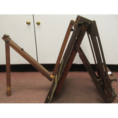 108 - An early 20thC artist's mahogany folding and adjustable easel and palette (reputedly, formerly the p... 