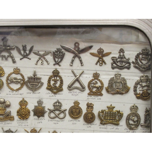 111 - Approx. one hundred military cap badges and other insignia, some copies: to include King's Own Royal... 