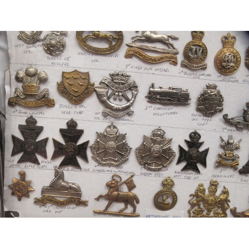 111 - Approx. one hundred military cap badges and other insignia, some copies: to include King's Own Royal... 