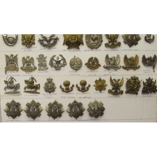 115 - Approx. thirty-five military cap badges and other insignia, some copies: to include Black Watch, 8th... 