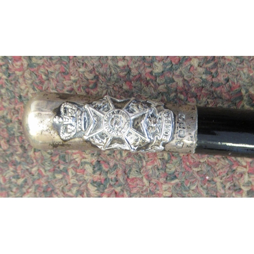 116 - A military swagger stick, the tapered, ebonised shaft with a silver cap terminal, embossed with the ... 