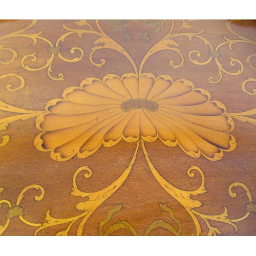 117 - A late 19thC galleried kidney shape serving tray with marquetry ornament and opposing brass handset ... 