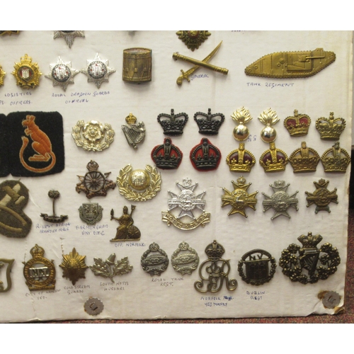 120 - Approx. one hundred and twenty military cap badges, uniform titles and other insignia, some copies: ... 