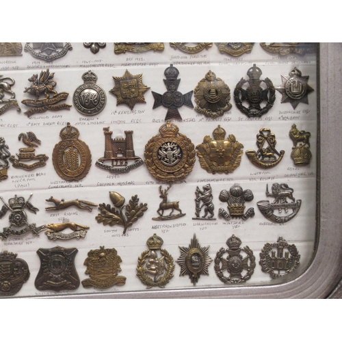 123 - Approx. one hundred military cap badges and other insignia, some copies: to include Yorkshire Husser... 