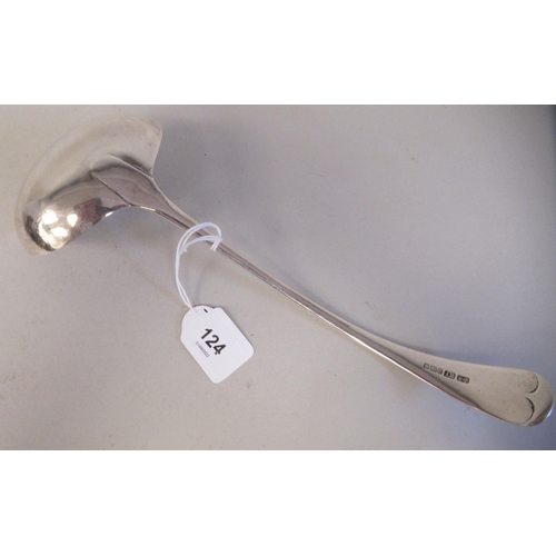 124 - An Edwardian silver Old English pattern soup ladle with an oval bowl  JR  Sheffield 1908