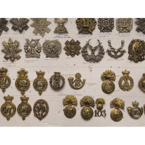 140 - Approx. seventy military cap badges and other insignia, some copies: to include 1st Aberdeenshire, T... 