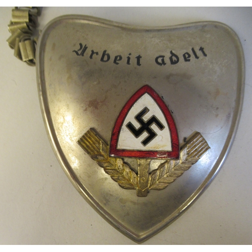 141 - A German flag bearer gorget for Reich Labour Service; and another with an SS emblem and a Streifendi... 