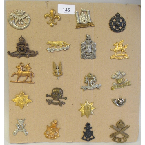 145 - Twenty regimental cap badges and other insignia: to include Queens Own Yeomanry, Royal Home Artiller... 