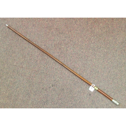 146 - An antique military style cane swagger stick/swordstick with a Royal Lancers cap terminal, the squar... 