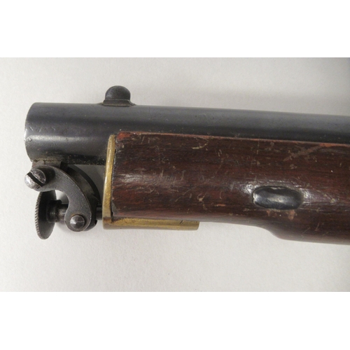 159 - A late 19thC design pistol with brass fittings and a butt hook(Please Note: this lot is subject to t... 