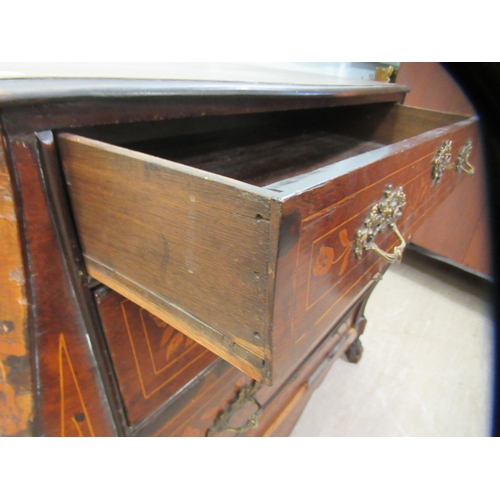 178 - An early 19thC Dutch mahogany and floral marquetry bombe front chest, having a serpentine outlined t... 