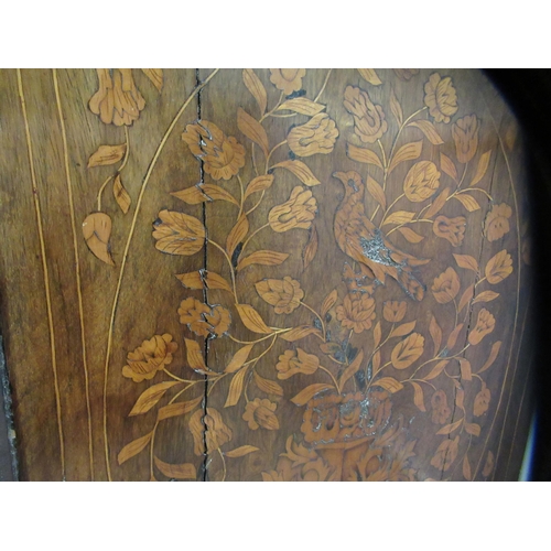 178 - An early 19thC Dutch mahogany and floral marquetry bombe front chest, having a serpentine outlined t... 