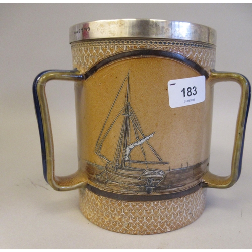 183 - A Victorian Doulton Lambeth stoneware, three handled tyg of cylindrical form, decorated with incised... 