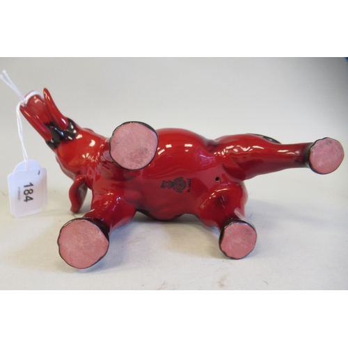 184 - A Royal Doulton flambe glazed model, a trumpeting elephant  5.5