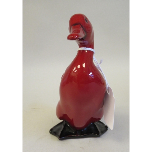 185 - A Royal Doulton flambe glazed model, a standing Drake  6