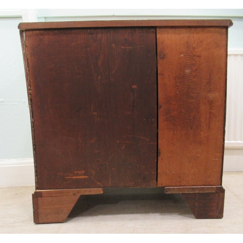 186 - A 19thC figured veneer walnut kneehole desk, over a shallow frieze drawer, flanked by six short draw... 