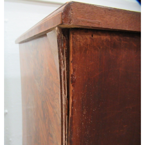 186 - A 19thC figured veneer walnut kneehole desk, over a shallow frieze drawer, flanked by six short draw... 