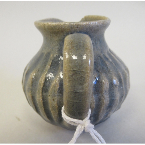 188 - A Katharine Pleydell-Bouverie miniature stoneware jug of reeded bulbous form  2