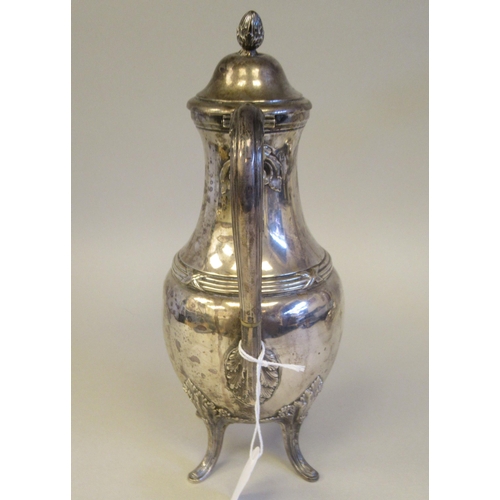 202 - A Continental white metal coffee pot of bulbous form, having a long, waisted neck, domed lid, S-shap... 