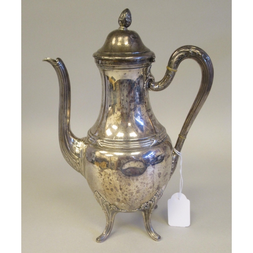 202 - A Continental white metal coffee pot of bulbous form, having a long, waisted neck, domed lid, S-shap... 