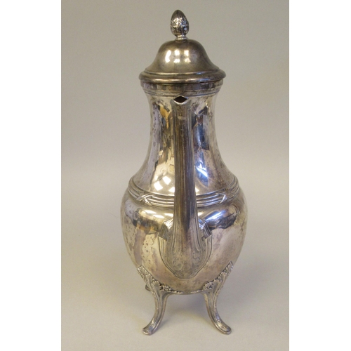 202 - A Continental white metal coffee pot of bulbous form, having a long, waisted neck, domed lid, S-shap... 