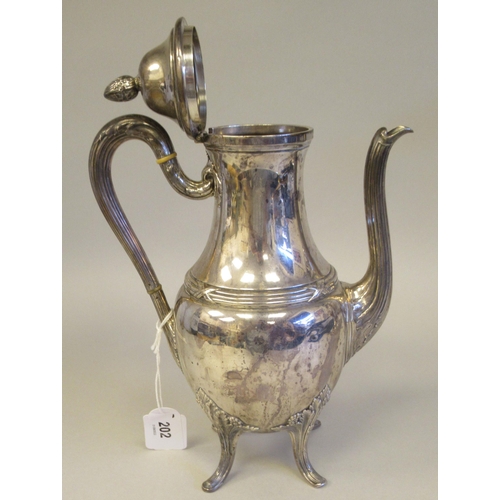 202 - A Continental white metal coffee pot of bulbous form, having a long, waisted neck, domed lid, S-shap... 