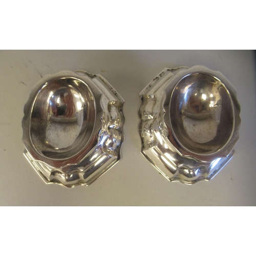 203 - A pair of silver trencher salts of oval, serpentine outlined form  George Nathan & Ridley H... 