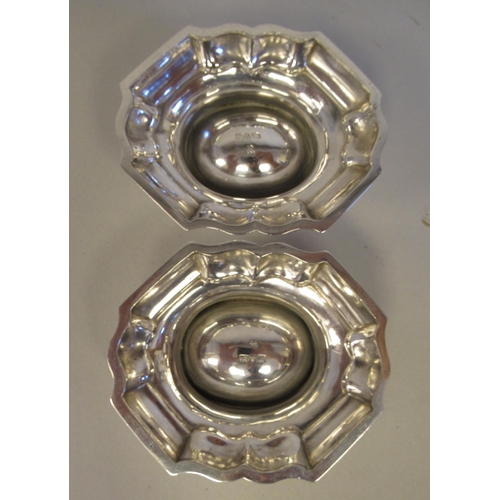 203 - A pair of silver trencher salts of oval, serpentine outlined form  George Nathan & Ridley H... 