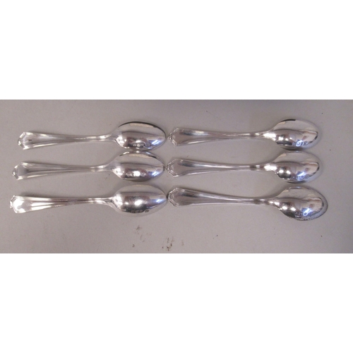 21 - A set of six silver teaspoons and a matching pair of claw type sugar tongs  Barker Bros  B... 