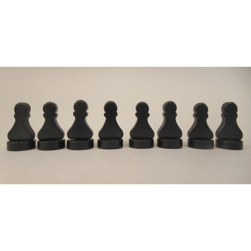 217 - A 1930s Grays of Cambridge Silette chess set, the catalin chessmen in black and 'marbled' yellow, th... 